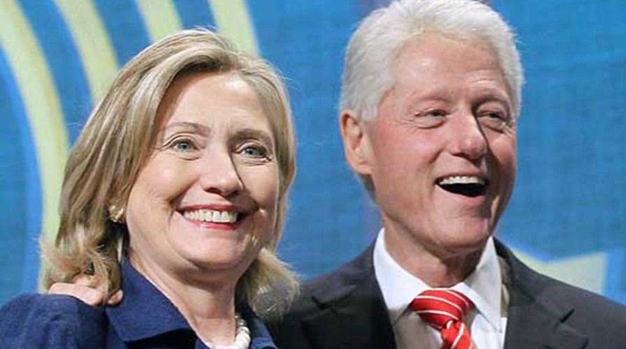 Bill Clinton defends Hillary over family finance comments