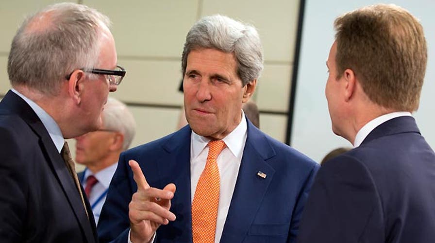 Kerry’s pushes for a united Iraq amid Syria, Iran concerns