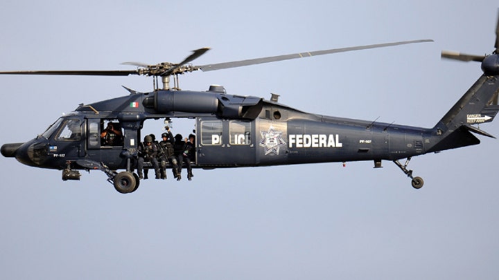 Mexican military chopper fires at border patrol agents
