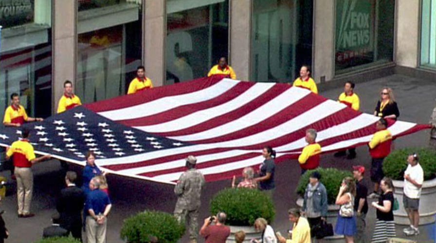 American flag dedicated for wounded heads to Bagram