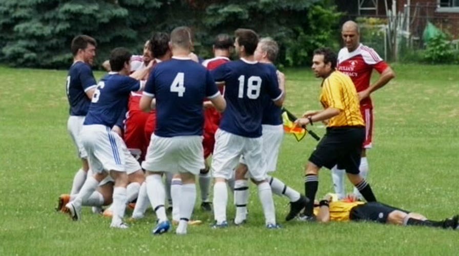 Player punches referee in throat during soccer game