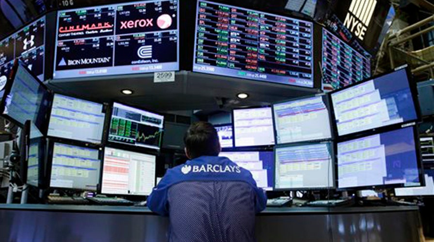 Dow tops 17,000 for the first time