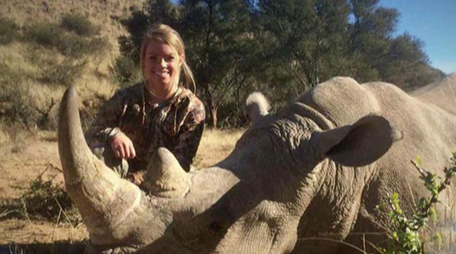 Cheerleader defends big game hunts