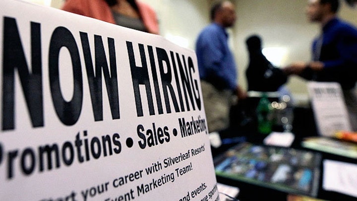 Strong jobs report sparks debate over jobless benefits