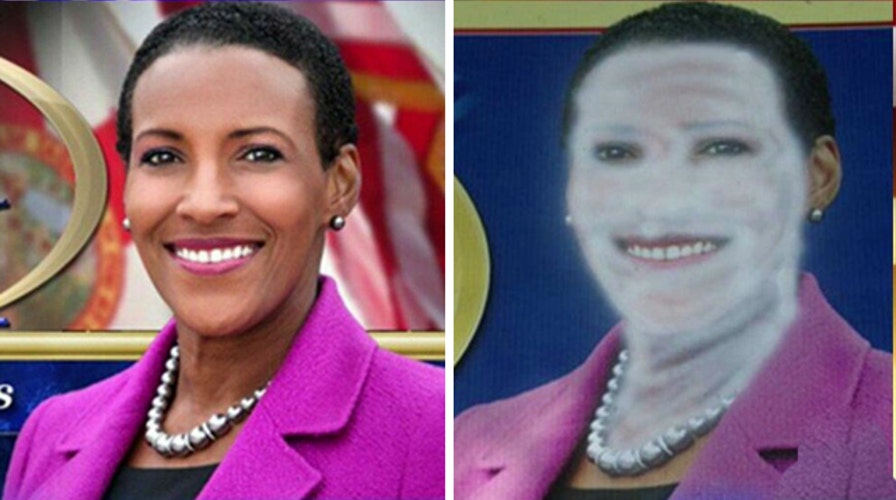 Vandal paints GOP candidate's poster white