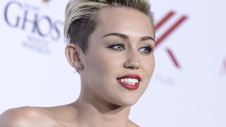 Miley Cyrus going too far in trippy, nude music video?