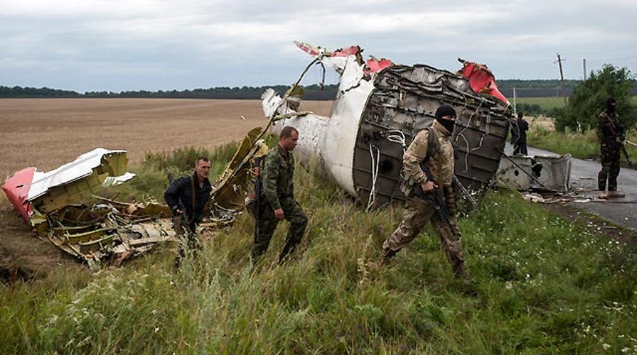 World demands answers after Malaysian jet crashes in Ukraine