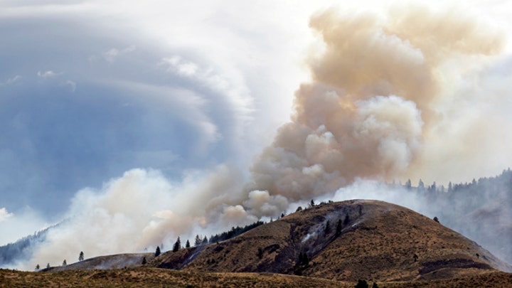Washington state's record-setting wildfire barely contained