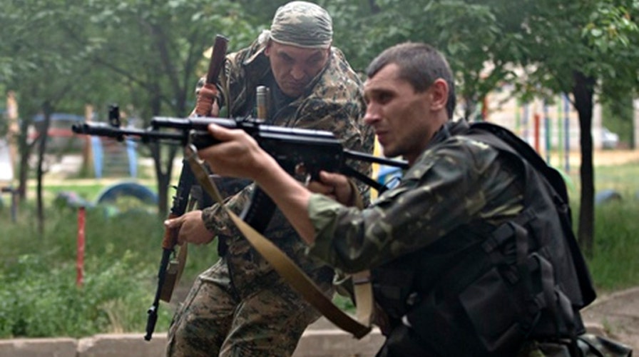 Fighting in Ukraine continues in wake of plane attack
