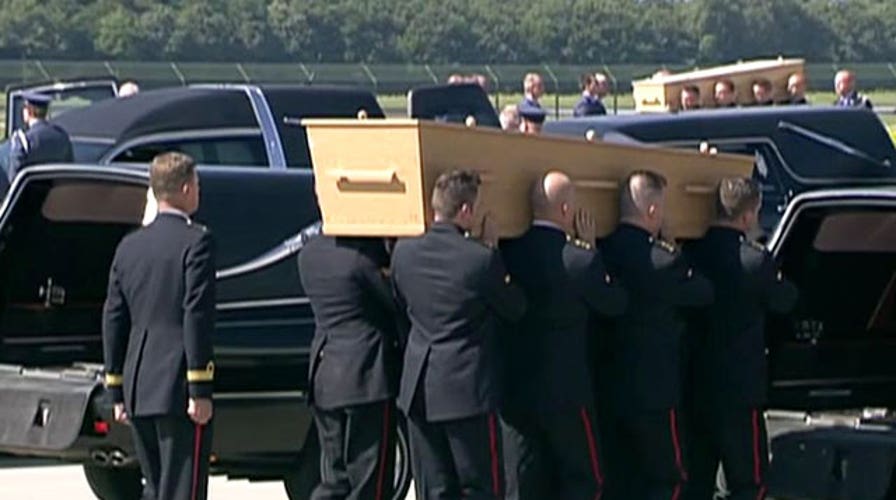 Remains of Flight MH17 victims arrive in the Netherlands