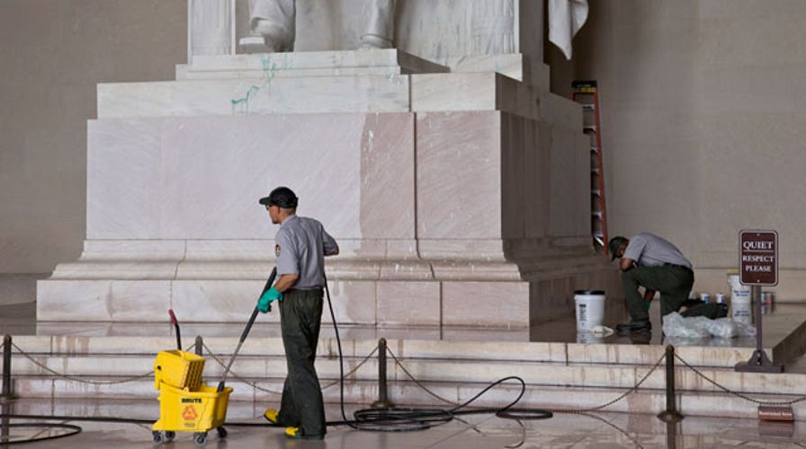 Suspect in custody over DC monument defacing