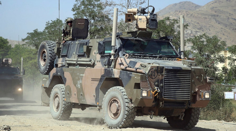 At least 1 American dead in shooting at Afghan army base