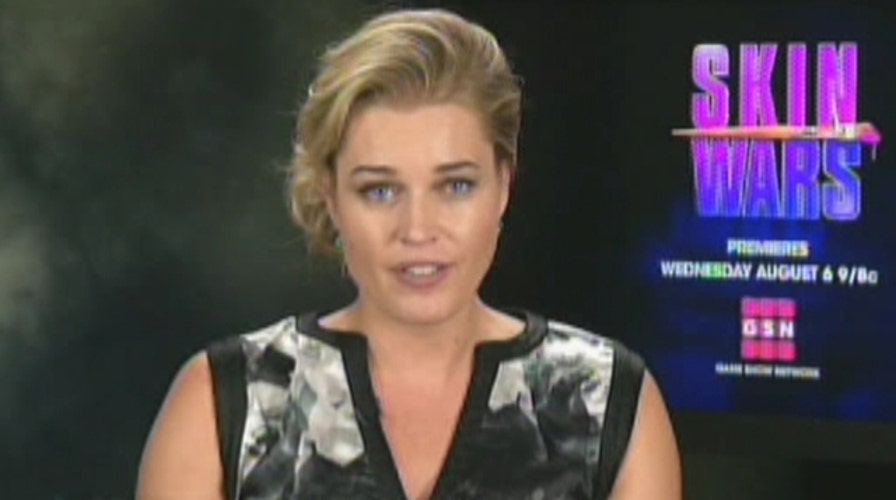 Rebecca Romijn on body paint: Prepare for blue toilet seats