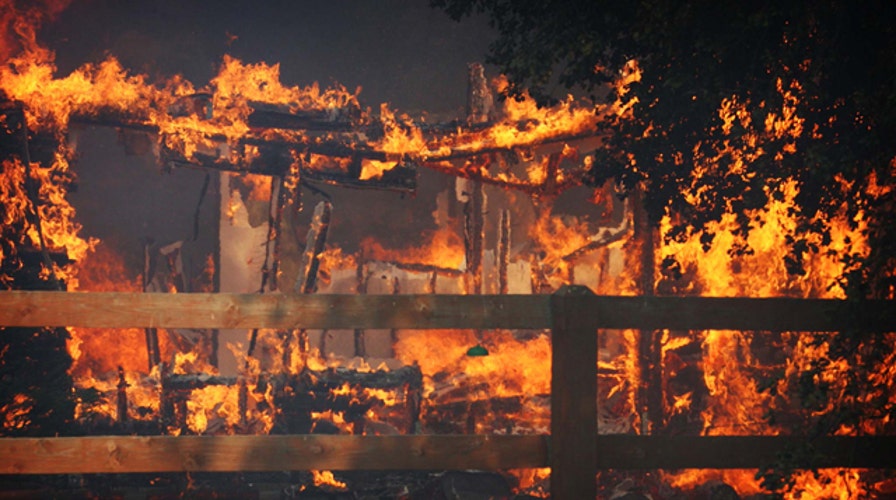 Out-of-control wildfire forces hundreds from homes in Calif.