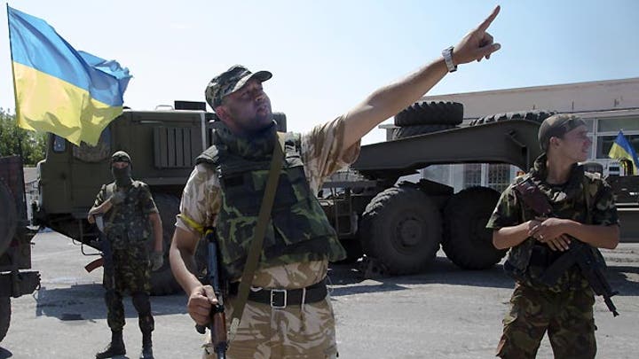 Ukraine rejects rebels' truce, calls for complete surrender