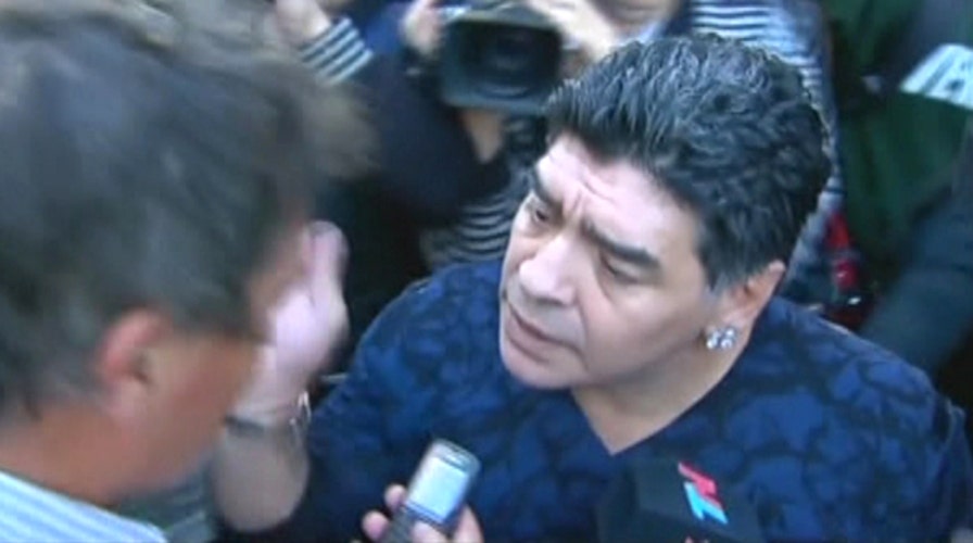 'Hand of God' strikes again: Diego Maradona slaps reporter
