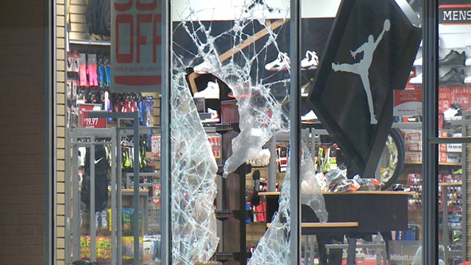 Protest over black Missouri teenager's shooting by police turns to