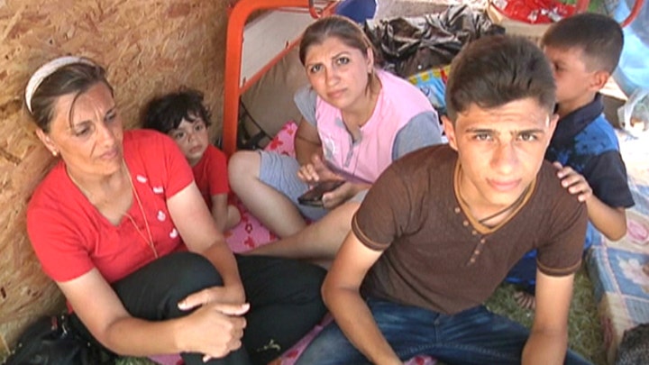 Irbil Christians and other minorities flee ISIS militants