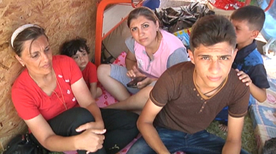 Irbil Christians and other minorities flee ISIS militants