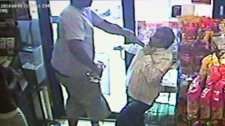 Police release surveillance video of strong-arm robbery