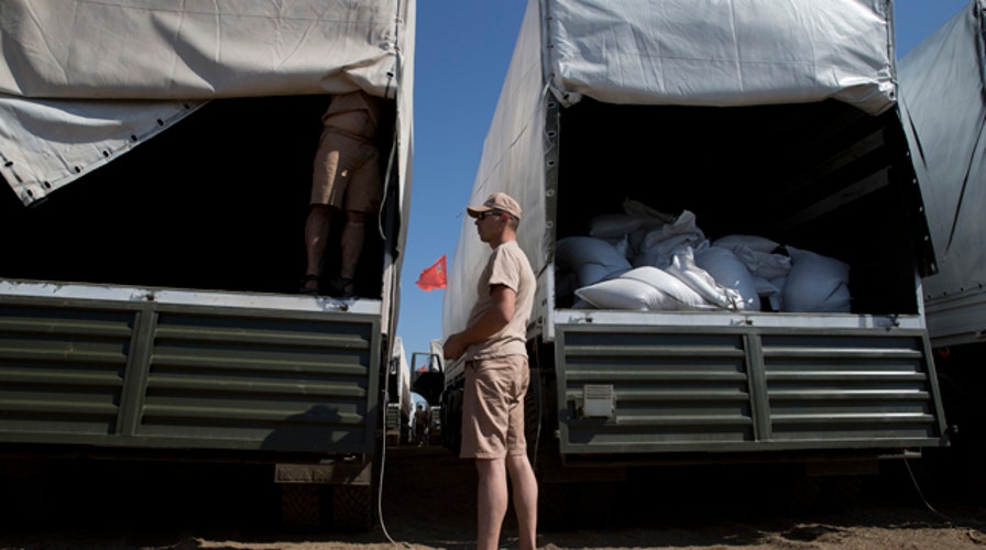 Red Cross inspects Russian aid convoy en route to Ukraine