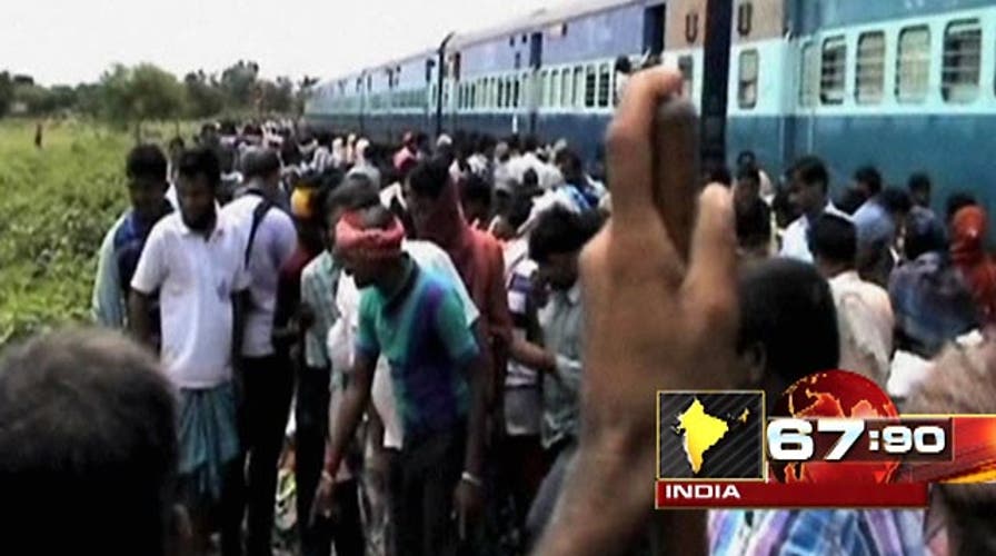 Train crash triggers violent protest in India