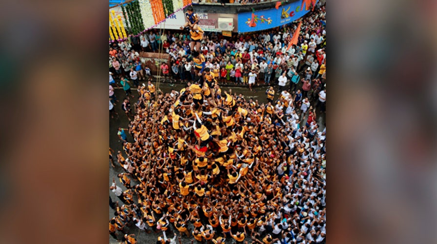 Huge human pyramid honors Hindu god