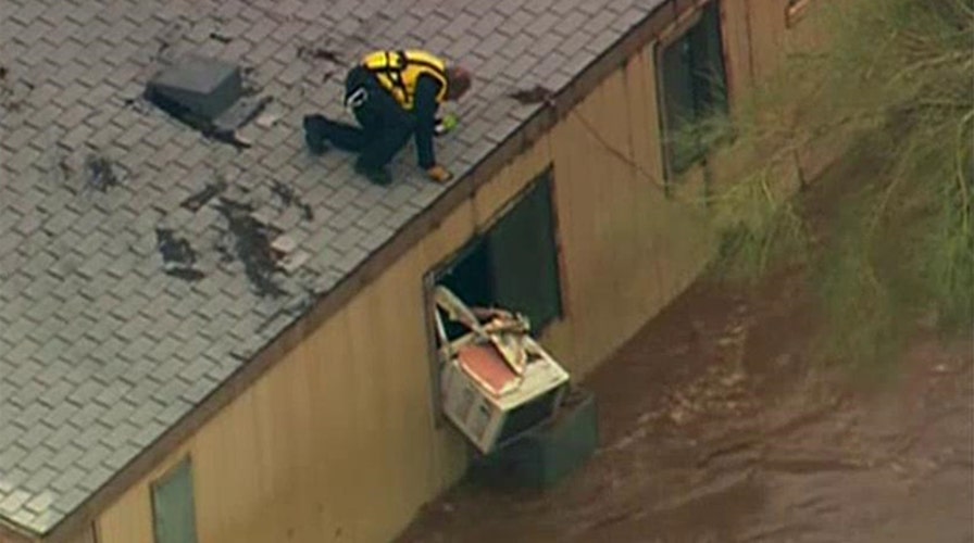 Flash floods rip through communities in Arizona