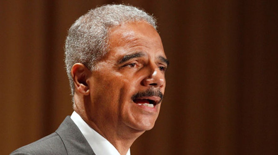 AG Holder blasts 'selective release' of Brown case info