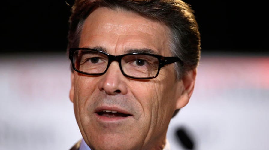 Perry vows to fight abuse of power charges