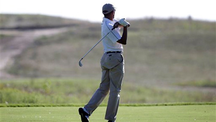 Obama under fire for golfing minutes after Foley statement