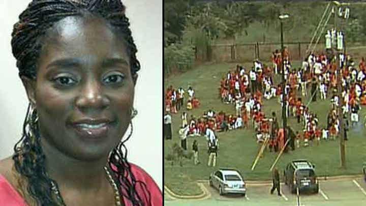 School bookkeeper gets gunman to stand down during 911 call