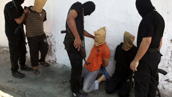 Hamas gunmen kill 18 alleged Israeli spies