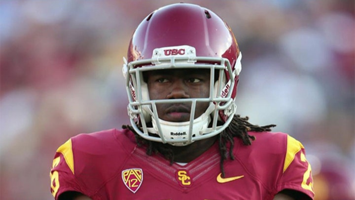 USC 'vetting' injured football player's alleged heroics