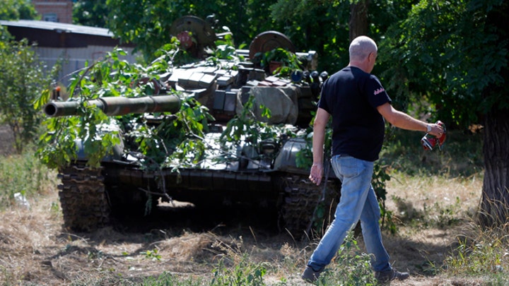 Russia denies launching invasion of Ukraine