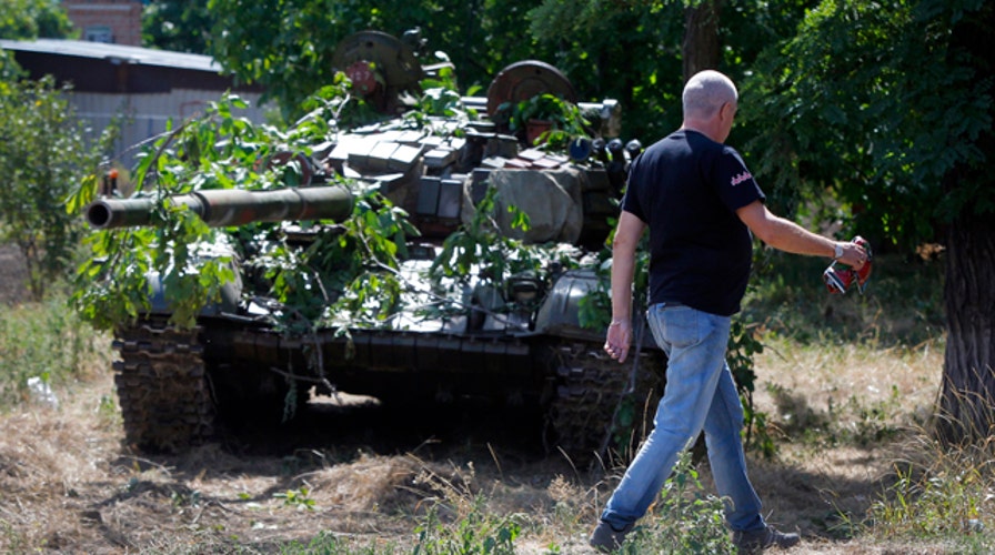 Russia denies launching invasion of Ukraine