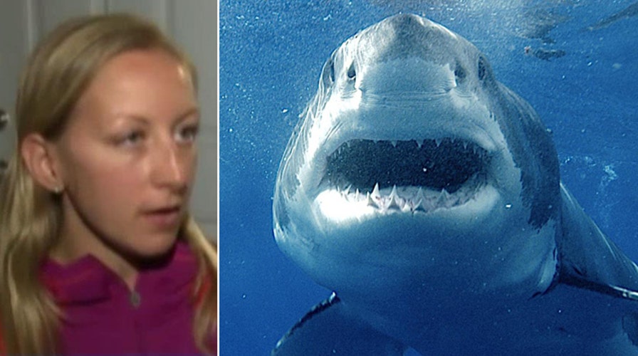 'Help! Help!': 911 call from water during shark attack