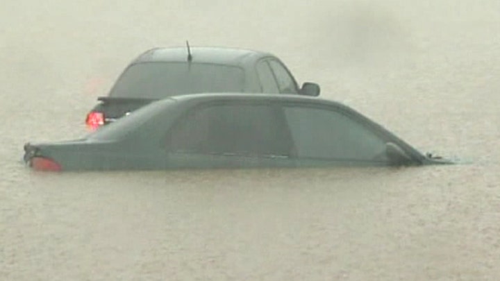 Heavy rains flood major roads in Arizona