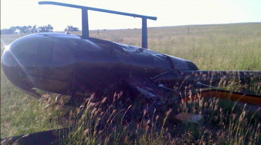 Film crew's camera rolling as helicopter crashes to ground