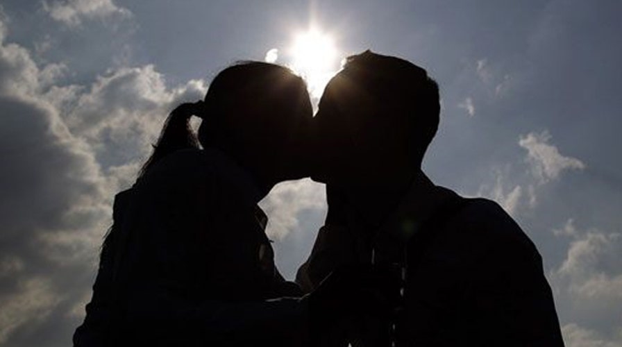 Dating site under fire for 'adopt an ugly person' campaign