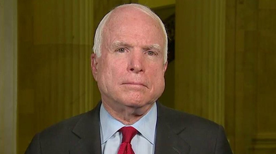 Sen. John McCain reacts to President Obama's address