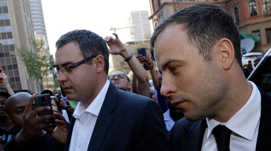 South African judge clears Pistorious of murder