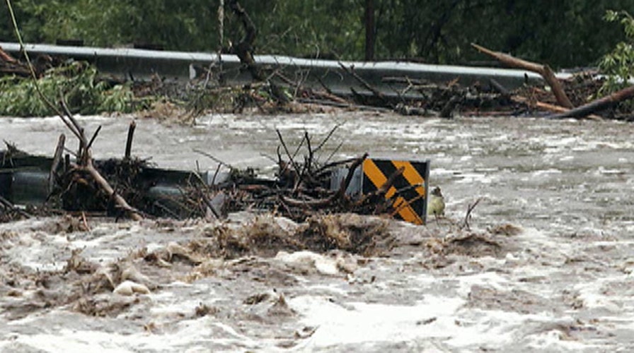 Rising waters in Colorado force thousands to evacuate 