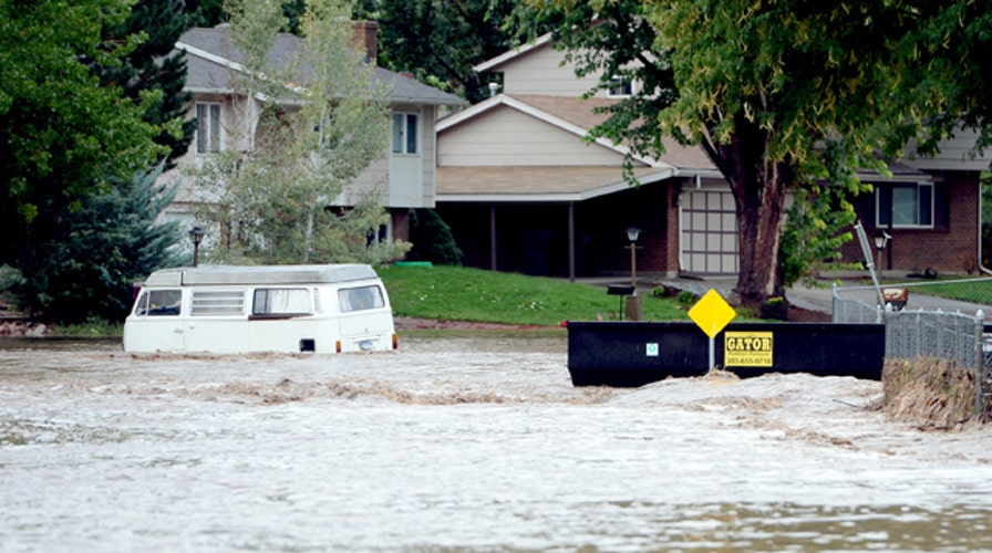 Historic, deadly Colorado floods force thousands to evacuate