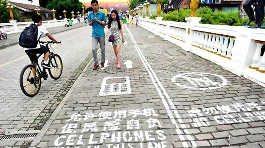 Grapevine: Chinese town has instated cellphone walking lanes