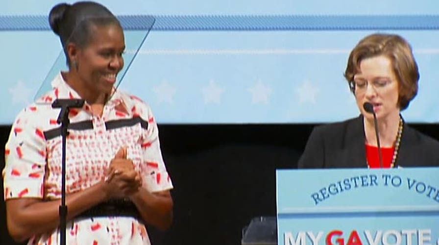Michelle Obama hits campaign trail for endangered Dems