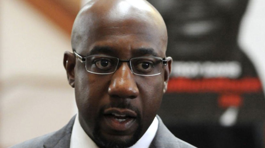 Voter fraud probe looms over tight Georgia Senate race