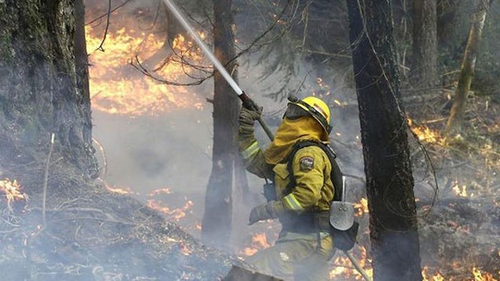 Wildfire burns out of control in central California