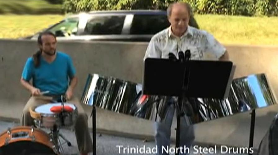 Steel drum band lightens mood in major traffic jam