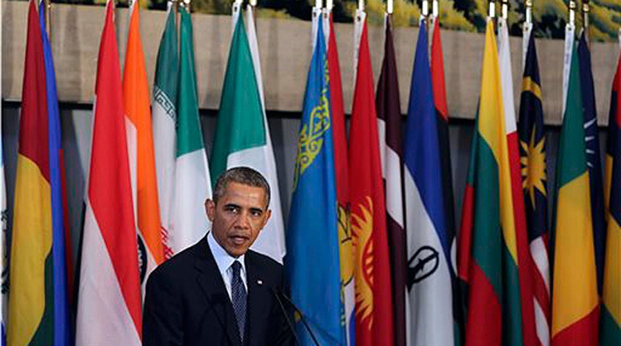 President Obama reaches out to new Iranian president  